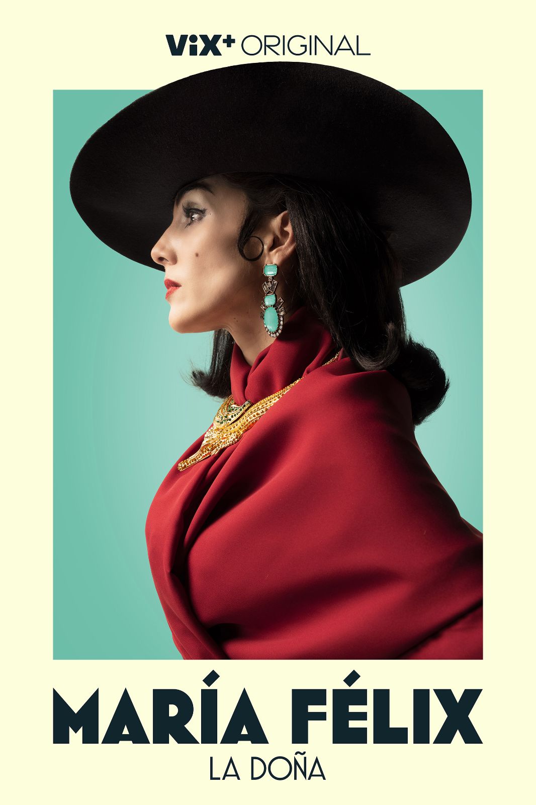 Ximena Romo casts a striking profile in a black wide-brimmed hat and turquoise earrings.