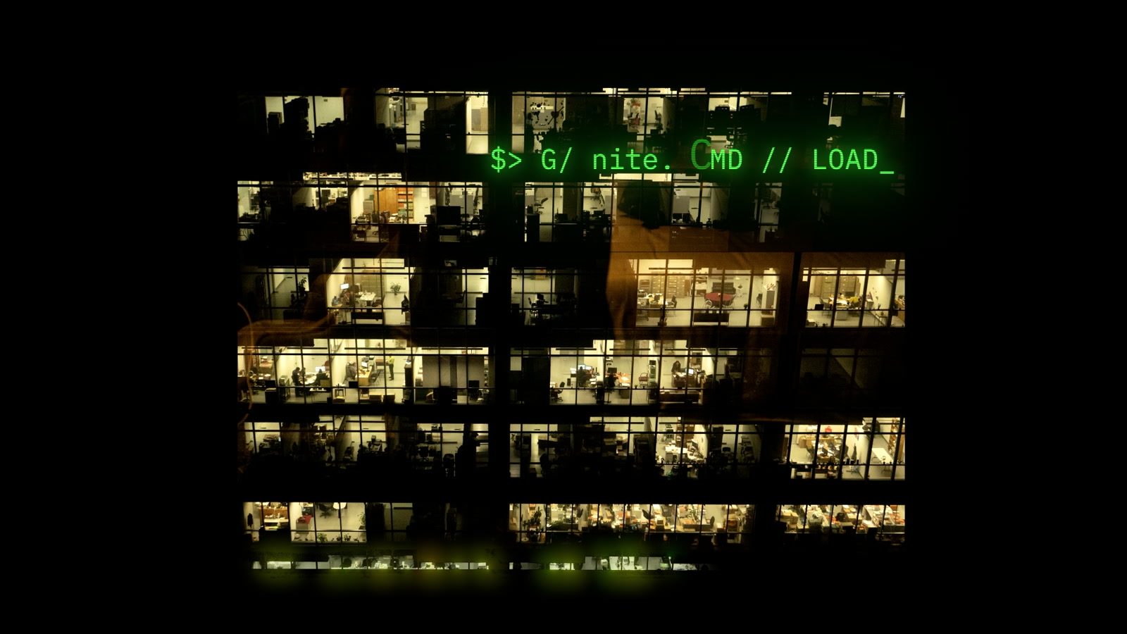 Floors of lit office windows glow out of the darkness as green terminal text types across the frame.